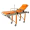 Stretcher with wheels and an automatic folding mechanism