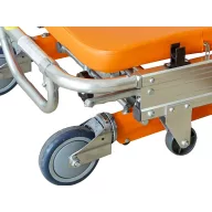 Stretcher with wheels and an automatic folding mechanism
